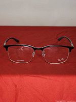 Front view of Ray-Ban RB6518 frame showing square shape and demo lenses with logos