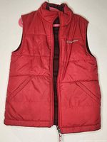 Front view red quilted side with logo and pockets