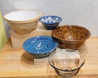 Group shot of five assorted bowls showing size, shape and finishes