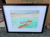 Front view of framed watercolor landscape artwork with barn, mat and frame visible