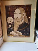 Full view of framed lithograph in mat and frame