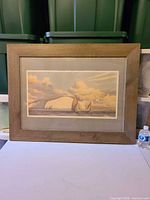 Framed Martin Swan print on table, full view