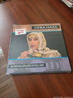 Front sleeve with shrink and price sticker