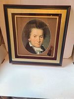 Front view of framed Beethoven portrait with 3-D violin