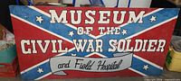 Full view of Civil War Museum sign showing complete graphics and size context