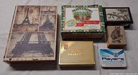 All six boxes and tins top view showing graphics and sizes
