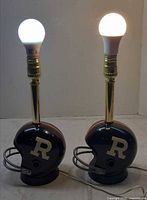 Both helmet lamps lit with bulbs installed