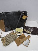 Front view of tote with accessories arranged