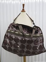 Full view of LeSportsac duffel on mannequin