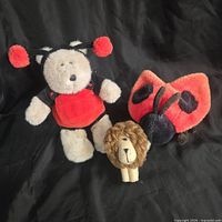 Group shot of all three Steiff plush toys
