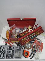 overall view of toolbox open with tools spread