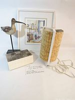 All four items: framed print, bird decoy, cork table lamp, trinket box