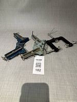 Three corner clamps and one black angle clamp overview