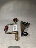 Top view of hand brace drill and Stanley plane side by side