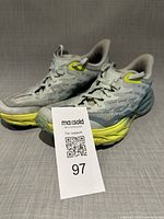 Side view of both shoes showing exterior condition and colorway