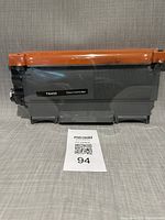 Front view of sealed Brother TN450 toner cartridge