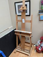Front view of full wooden easel showing structure and height
