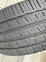 Close-up of tread pattern on one tire