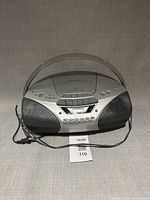 Front view of Sony silver/black boombox with speakers and controls visible