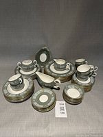 Full dinnerware set stacked and grouped