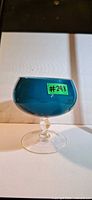 Side view of teal Empoli glass snifter vase showing color, shape and pedestal