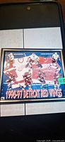 Overall view of framed Detroit Red Wings 1996-97 championship poster