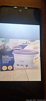 Front of retail box showing Dr. Scholl's Thermal Therapy Quick-Heat Paraffin Bath image and branding