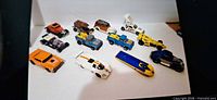 group shot of all twelve Hot Wheels vehicles on white backdrop