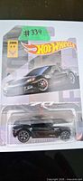 Front of sealed Hot Wheels C6 Corvette blister pack showing car and card art