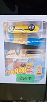 Front view of sealed Hot Wheels ’55 Corvette die-cast car in original packaging