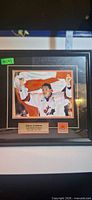 Front view of framed photo showing Mario Lemieux with Canadian flag, double mat, nameplate and Team Canada logo patch