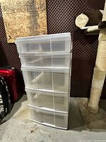 Front view of clear plastic 5-drawer rolling storage tower