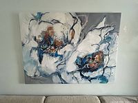 Full view of abstract floral canvas print mounted on wall
