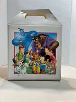 Closed carrying case front showing Disney characters graphic