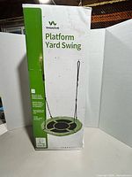 Front of sealed box showing VivaActive Platform Yard Swing product image and specifications