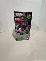 Front of retail box showing 4 ft Airblown Inflatable Christmas Dachshund