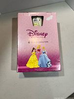 Front of boxed Royal Doulton Disney Princess mug