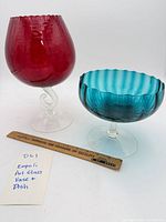 Both Empoli art glass pieces together with ruler for scale