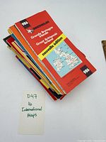 Stack of folded maps, top showing Michelin 986 Great Britain & Ireland