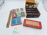 Overview of lot showing Reliance chip box, chip-o-racks box with racks, playing cards