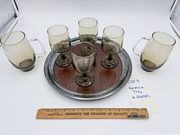 Overall lot showing tray with six glasses and ruler for scale