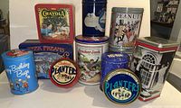 Group shot of multiple tins showing brands and shapes