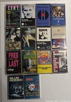 All fourteen cassette tapes laid out for overview