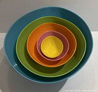 Top view of nested five melamine bowls