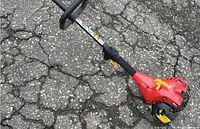 Grip area with safety labels and debris guard