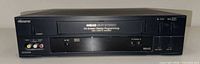 Front view of Memorex MVR4048 VCR showing cassette slot, controls and branding
