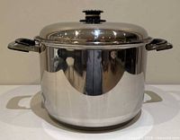 Full view of stainless steel stock pot with lid attached