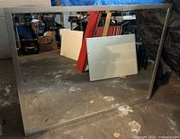 Front view showing mirror surface and metal frame