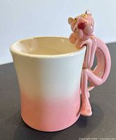 Full view of mug showing gradient glaze and attached Pink Panther handle
