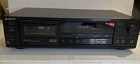 Front view of Sony TC-RX55 cassette deck showing entire unit and controls